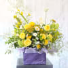 This yellow and Green color combination handtie bouquet arrangement brings in a