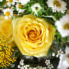 This yellow and Green color combination handtie bouquet arrangement brings in a