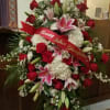 This large and graceful standing spray is a beautiful expression of sympathy