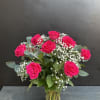 Long stemmed premium roses, with baby&rsquo;s breath and greens. Perfect for any