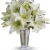 This classic silver and white arrangement is a stunning way to let