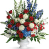 A dazzling display of patriotic red, white and blue flowers sends a