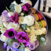 Beautiful hand-crafted flower gift with macaroons in a box. 
Includes roses, anemones