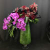 Tall, modern design with Phalaenopsis and cymbidium orchids, dark purple ( black)