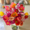 Lively and bright Holiday arrangement of gorgeous warm and vivid colors of