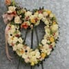 A beautiful mixture of pastel colored flowers that are artfully put together