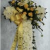 Blissful cross in whites and yellows with a satin ribbon accented to