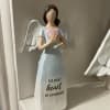 Sweet Angel carrying a huge message. Ceramic Resin. Will be wrapped for