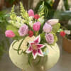 Roses, Tulips, and Stargazer Lillies combine in an elegant and captivating bouquet.


Please