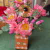 Pink combination of gorgeous flowers in a Mexican style talavera container. 