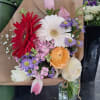 A traditional classic fresh flower wrap. This arrangement is sold WITHOUT a