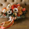 A lush, hand-tied bridal bouquet.

Please note your color and flower preference in