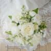 A lush, hand-tied bridal bouquet.

Please note your color and flower preference in