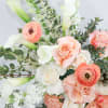 Delicate and sweet, combination of shades, peach and white. This bouquet features