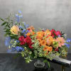 Full of mix colors arrangement , is sitting in a pedestal Cristal