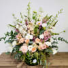 Base on Peach with touch of white and hanging greenery.
For Sympathy, Occasion.