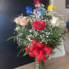 Twelve color Roses  in vase  with greenery and baby breath