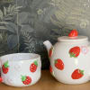 This ceramic teapot and mug set is the perfect gift. Hand painted