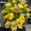 One-sided bright and beautiful yellow, green and and white floral