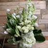 An elegant collection of textures and fragrances are overflowing from this tall