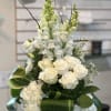 An elegant collection of textures and fragrances are overflowing from this tall