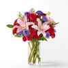 This dreamy jewel toned bouquet combines bold color and eye catching texture