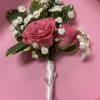 Boutonni&egrave;re, a fresh rose with accents of baby&#039;s breath