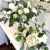 Beautiful white flowers in a garden style mix with eucapyptus