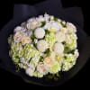 Premium white florals wrapped in matte black wrapping.