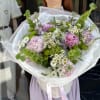 A fresh and whimsical bouquet that captures the essence of a blooming
