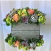 A colorful combination of succulent and fresh flowers. Colors of wood and