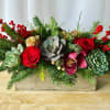 A colorful combination of succulent and fresh flowers. Colors of wood and