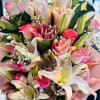 Beautiful bouquet of oriental lilies and pink roses, special for any occasion.