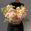 A modern take on floral gifting, this beautiful and tender spring arrangement