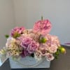 Romantic and refined, our Blushing Elegance Pearl Crate is a floral arrangement
