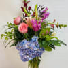 Eye catching bouquet filled with a lot of color. Hydrangea, Garden Roses