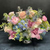 A soft, romantic palette that evokes elegance and tranquility. This arrangement features