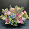 A soft, romantic palette that evokes elegance and tranquility. This arrangement features