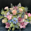 A soft, romantic palette that evokes elegance and tranquility. This arrangement features