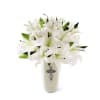 This striking display of pure white lilies will send your heartfelt expressions