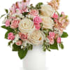 Nothing&#039;s sweeter than the prettiest pink and cream roses presented n a