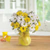 What could be sweeter than a cheerful yellow vase filled with white