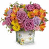 Like a bee dancing through a hidden garden, this enchanting bouquet of