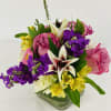 This fun colorful arrangement is sure put a smile on someone&rsquo;s face.
