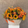Overflowing with golden hues and joyful blooms, Basket Full of Sunshine features