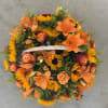 Overflowing with golden hues and joyful blooms, Basket Full of Sunshine features