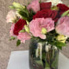 Soft and romantic with a bold twist, Love Notes blends red roses