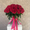 Bold and romantic, Seventh Heaven features a dramatic hand-tied bouquet of deep