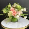 This beautiful arrangement includes pink Hydrangeas, Green Hydrangeas, Pink garden roses, white