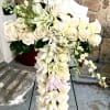 White Standing Cross adorned with white Roses and Lilies for the loveliest